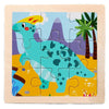 A wooden jigsaw puzzle featuring a blue dinosaur with green spots against a yellow background.