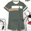 A gray colorblock short sleeve t-shirt and matching shorts set displayed on a hanger against a white background.