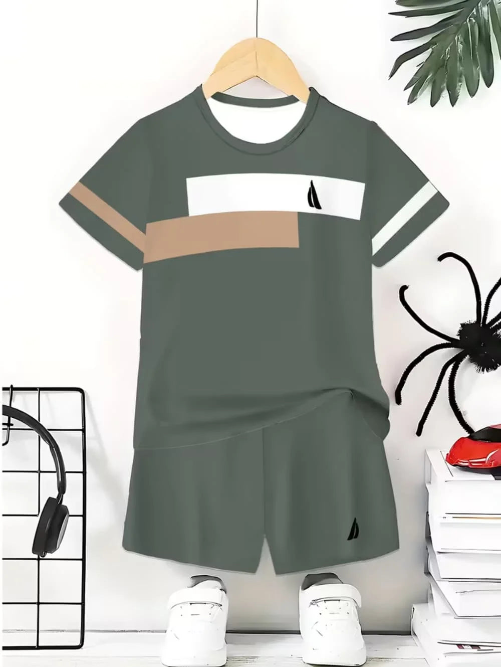 A gray colorblock short sleeve t-shirt and matching shorts set displayed on a hanger against a white background.