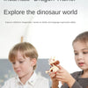 A young girl is exploring a dinosaur model with a boy, demonstrating an educational toy kit.