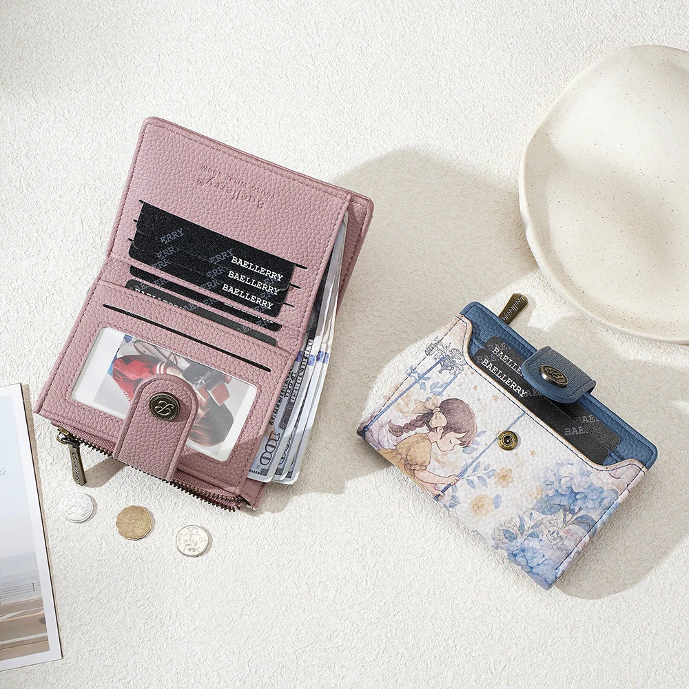 A pink leather wallet and a blue floral print wallet are displayed on a white surface.