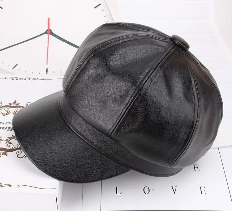 A black PU leather beret hat is shown resting on a white surface next to a clock face.
