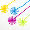 A set of ten colorful stretchy spider web sticky wall climbing toys in yellow, blue, and pink.