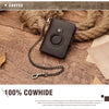 A dark brown Crazy Horse leather smart wallet with a chain strap is displayed on a wooden surface.