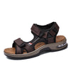 A pair of brown men's genuine leather air cushion sandals with dark straps and a light tan sole.