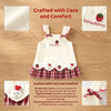A white kids summer pinafore dress with strawberry and bunny embroidery on the bodice and a red plaid skirt.