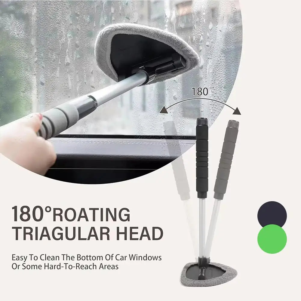 A close-up of an 180 degree rotating triangular head windshield cleaning brush being used on a car window.