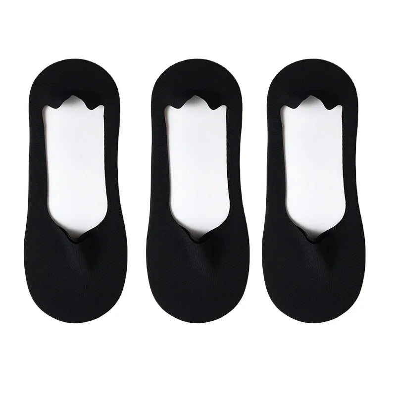 Three black silicone grip no-show socks displayed side by side.