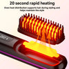 A black hair straightening brush is shown heating hair with bright orange light and steam rising from the heated section.