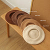 A collection of classic wool beret hats in various shades including coffee, light coffee, camel, khaki, and apricot displayed