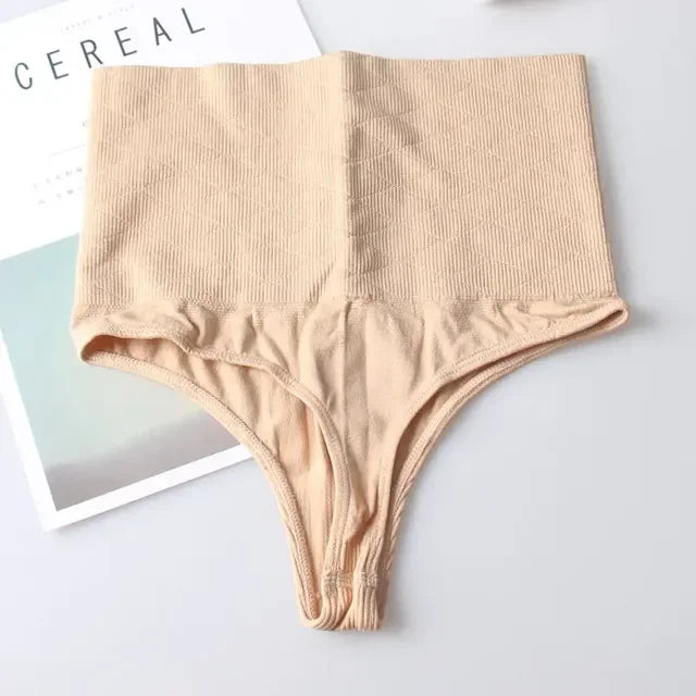 A beige high-waist tummy control butt lifter thong shaper garment laid flat on a white surface.