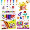 A box of Popcornpens art tools showing various colored pens and a hand using them to draw on paper.