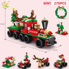 A set of 6-in-1 building blocks featuring a red and green train with Christmas elements like a snow house, Santa, and deer.