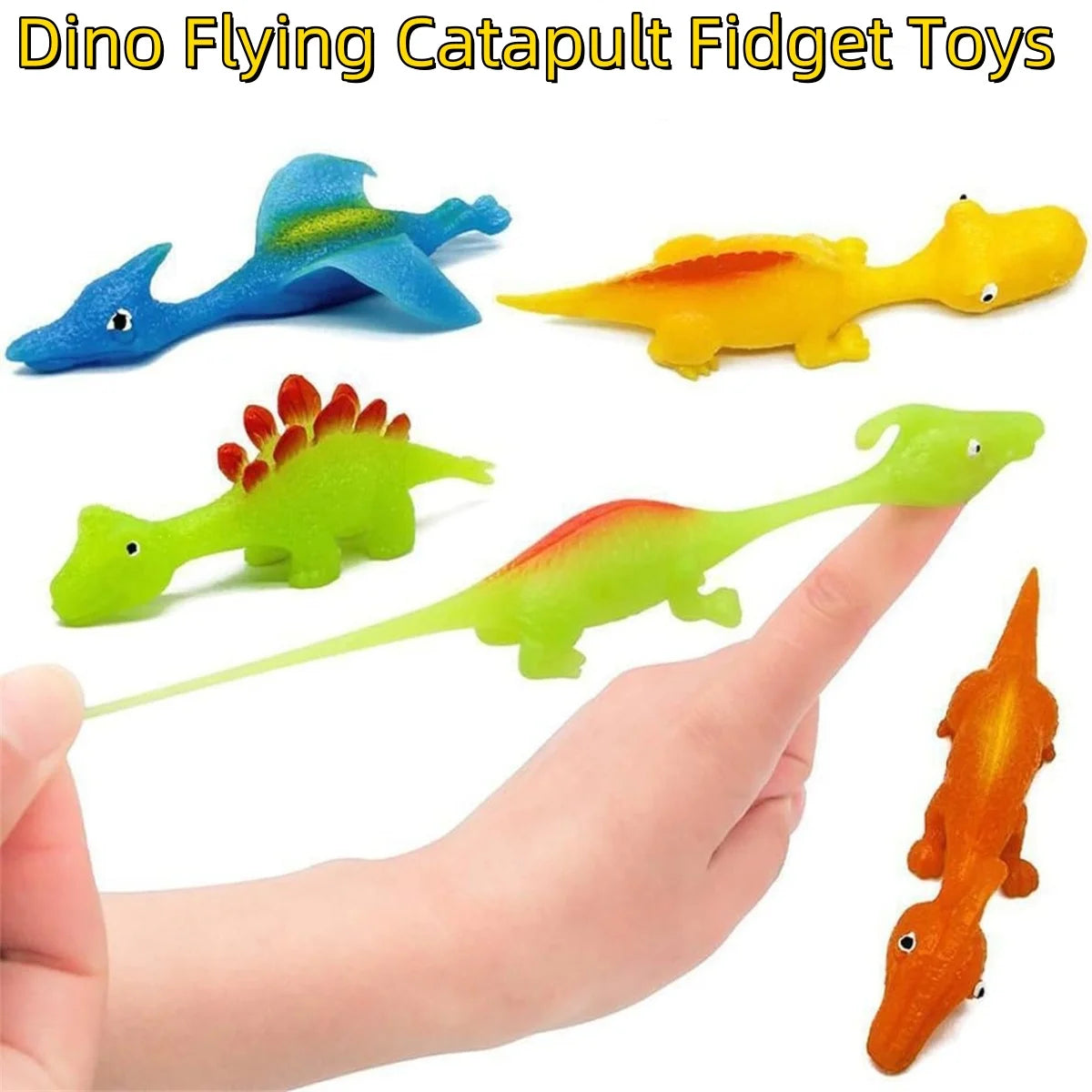 A hand is holding a colorful dinosaur finger catapult toy set, showing various dinosaur shapes and colors.