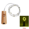 A roll of yellow LED fairy lights with a connector and a light bulb, shown next to its housing.