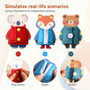 Montessori wooden busy board showing various clothing skills like snap buttons, zippers, and buttons on fabric garments.
