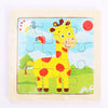 A wooden jigsaw puzzle featuring a yellow giraffe with orange spots and a red sun on a light blue background.