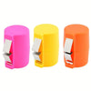 Three colored egg shell opener tools in pink, yellow, and orange.