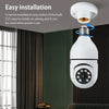 A white smart security camera is shown installed on a ceiling, ready for easy installation.