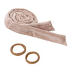 A light beige heatless curling rod headband rolled into a spiral shape.