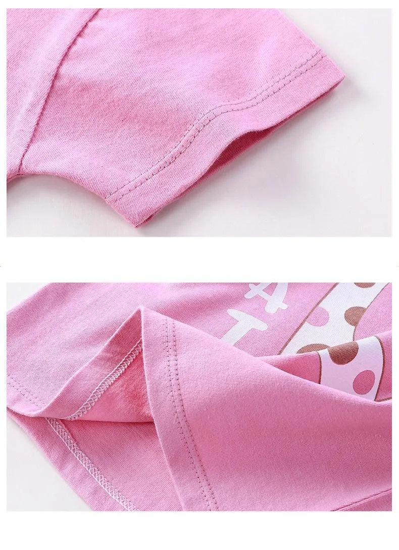 Pink dinosaur print kids short-sleeve t-shirt and shorts set shown in detail