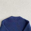 Navy blue soft cotton knit baby pullover sweater shown from the back