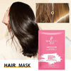 Pink packaging for a Solid Color hair mask treatment with a woman's dark hair in the background.