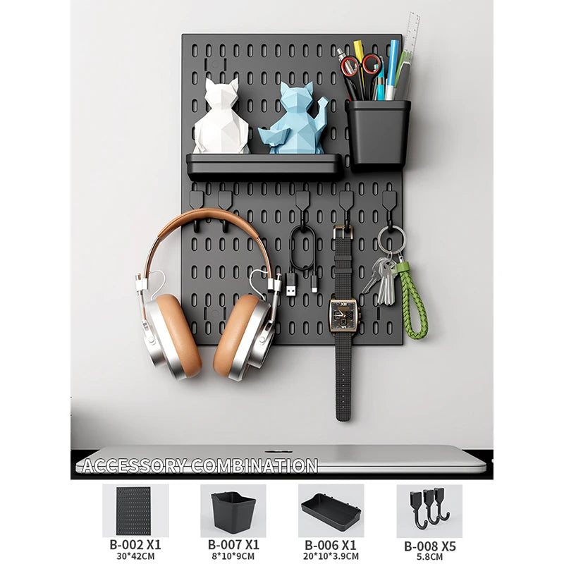 Modular wall pegboard storage panel with hooks and shelf featuring various accessories like keys and tools