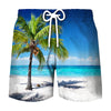 Blue swim trunks featuring a tropical coconut tree print on a beach background.