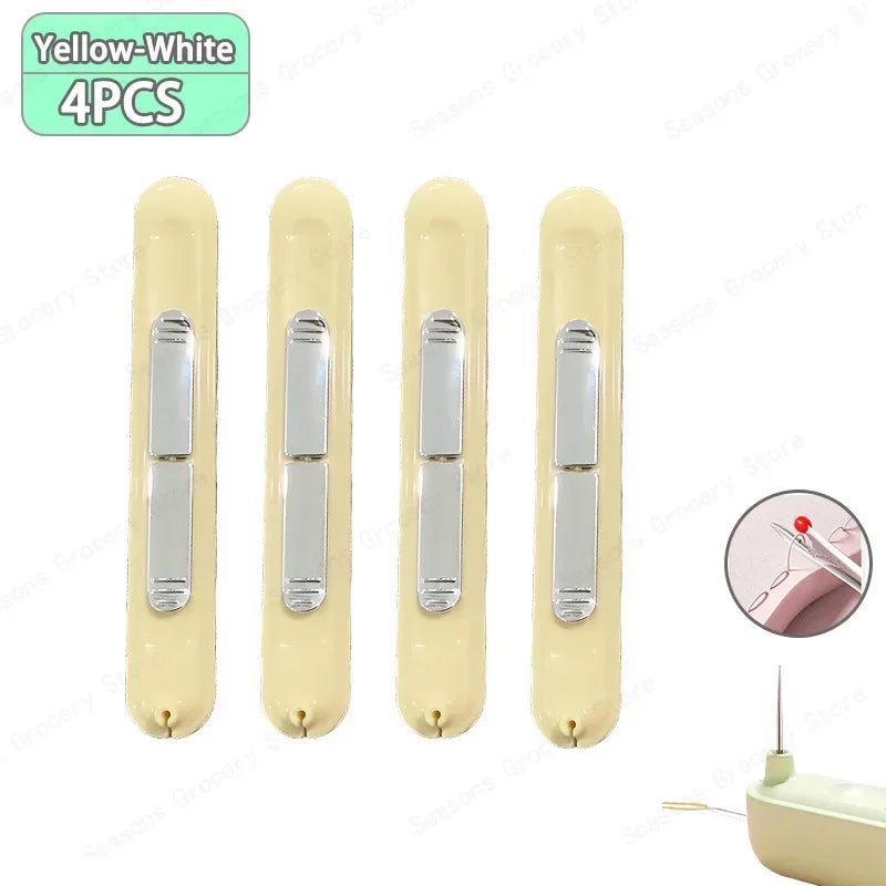 Four yellow-white needle threader and seam ripper tools are displayed together.