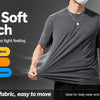 A man wearing a gray ultra soft stretch t-shirt demonstrating the fabric's movement and comfort.