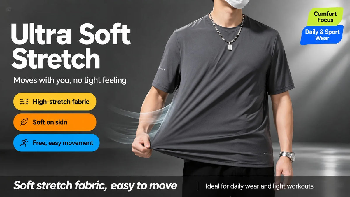 A man wearing a gray ultra soft stretch t-shirt demonstrating the fabric's movement and comfort.