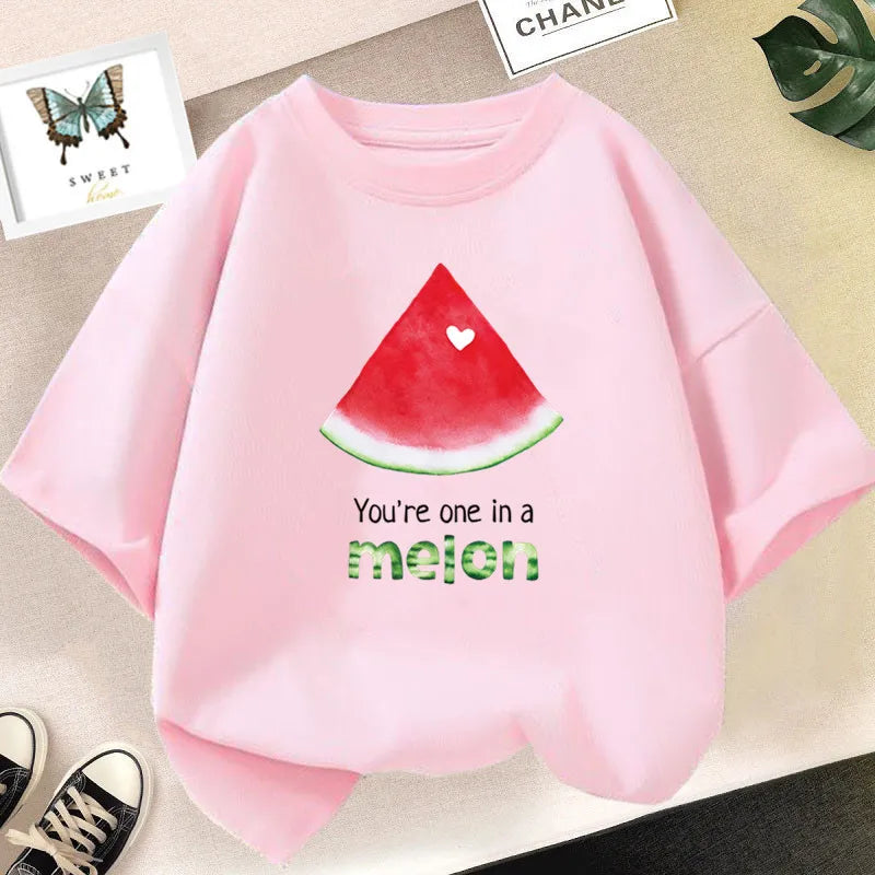 Pink kids t-shirt featuring a watermelon print and the text You're one in a melon