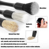 A set of three detailing brushes including microfiber, synthetic fiber, and natural boar hair brushes.