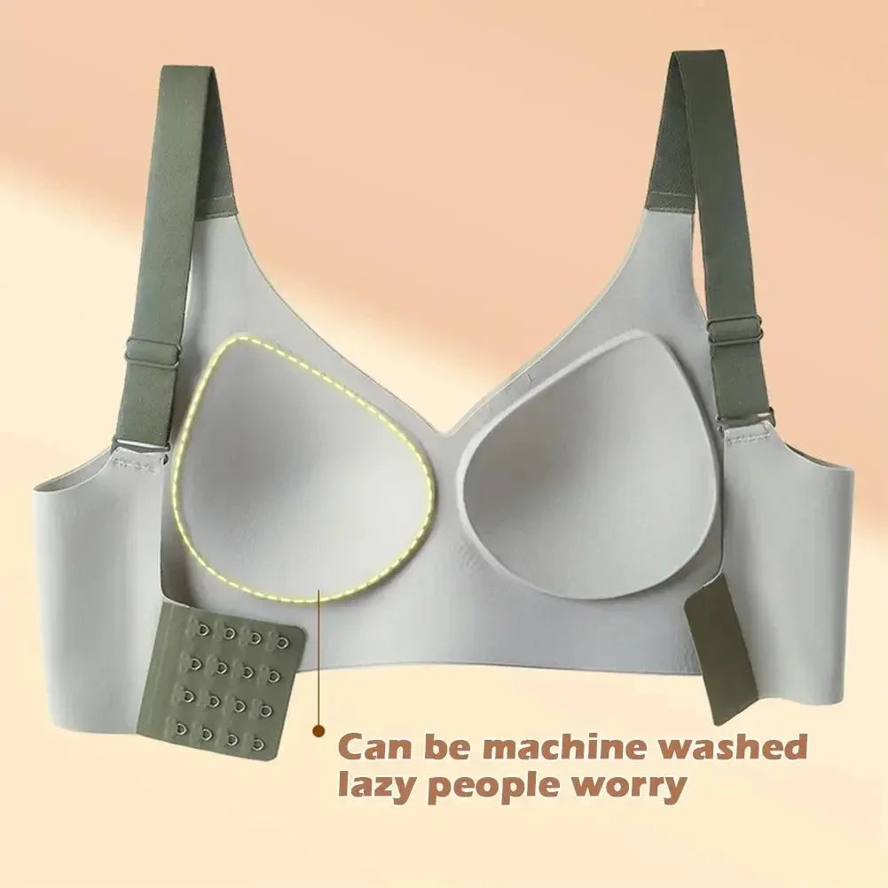A light gray seamless wireless push-up bra with supportive straps and a silicone pad is shown against a beige background.