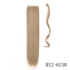 Long straight blonde hair extension in a wrap-around clip-in ponytail style