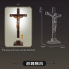 A detailed sculpture of the Passion of Christ on a wooden cross, shown with scale dimensions.