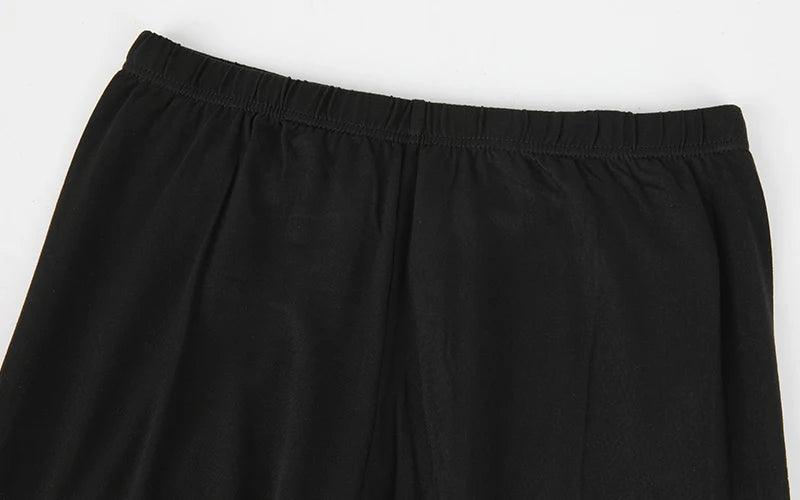 Black women's thermal underwear set with fleece lining shown from the waist down.