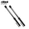 A pair of black, coiled battle rope handles for home workouts.