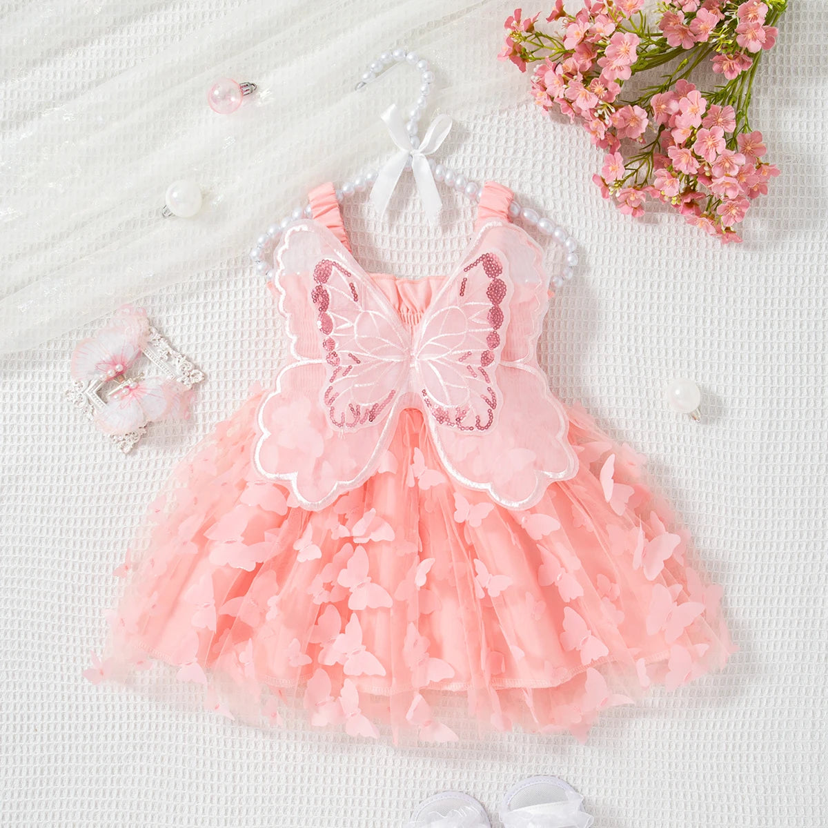 Pink sheer butterfly tulle dress for a baby girl