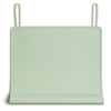 A light green silicone feeding placemat with a teething edge and hanging loops.