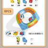 A set of magnetic train track building pieces including various colored trains and track components.