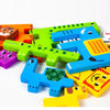 A colorful wooden animal transport puzzle set featuring various brightly colored dinosaur and animal shapes.