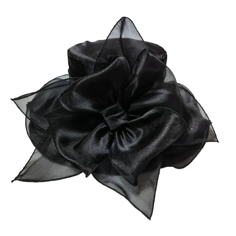 Black wide brim sun hat made of organza with ruffled mesh detailing