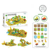 A box of Mag-Paradise smart train come across steam magnetic tiles set with various building pieces and a sliding car.