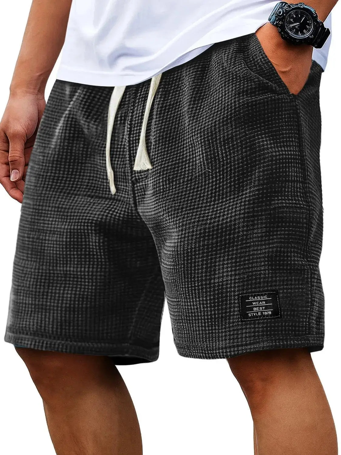 Shorts casuales negros para hombre con textura waffle y patrón a cuadros, con cordón.