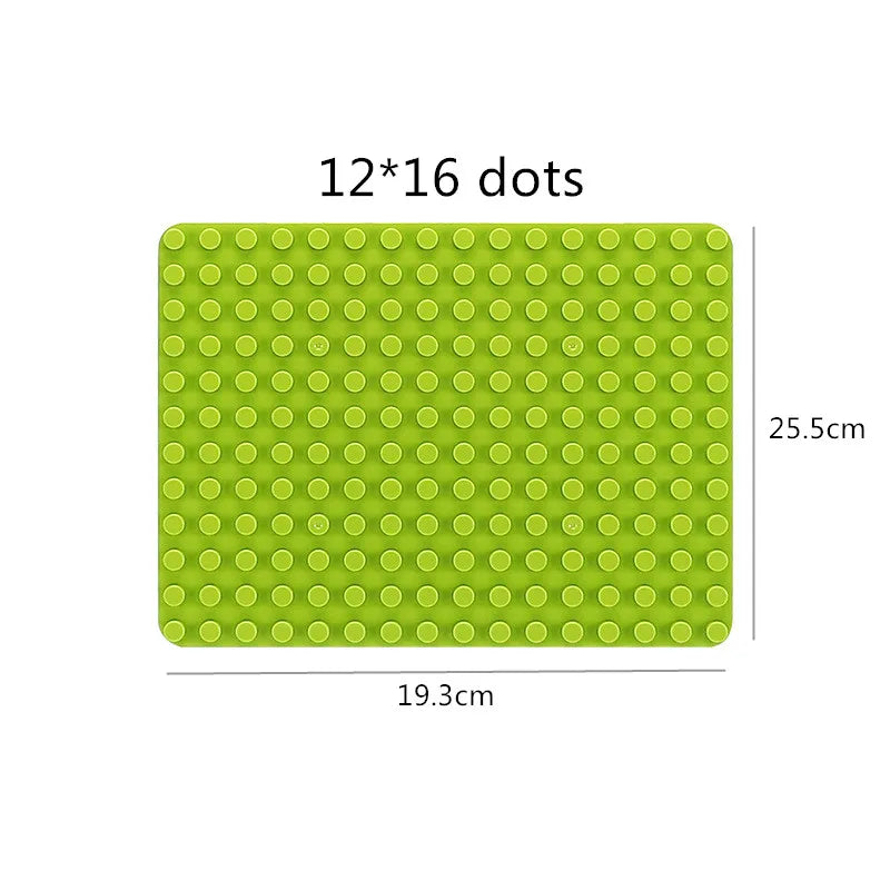 A green silicone mat with 12 by 16 dots for building marble run blocks