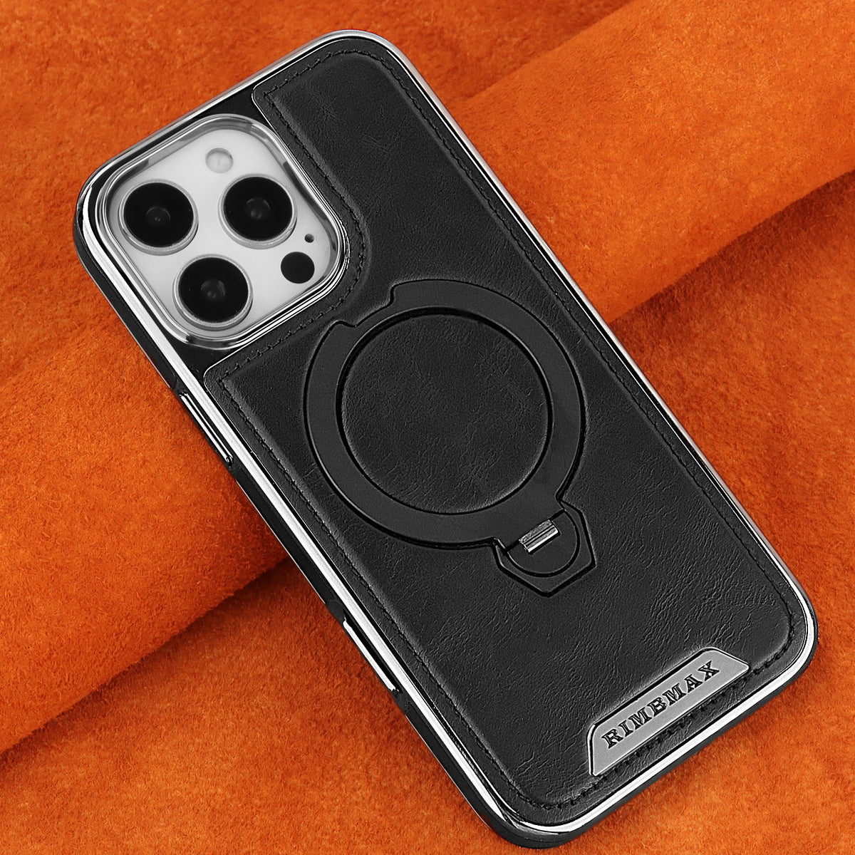 Black leather case with a magnetic stand feature for an iPhone placed on an orange fabric background.