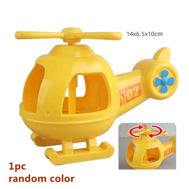 Yellow plastic marble run building blocks set with tracks and funnels