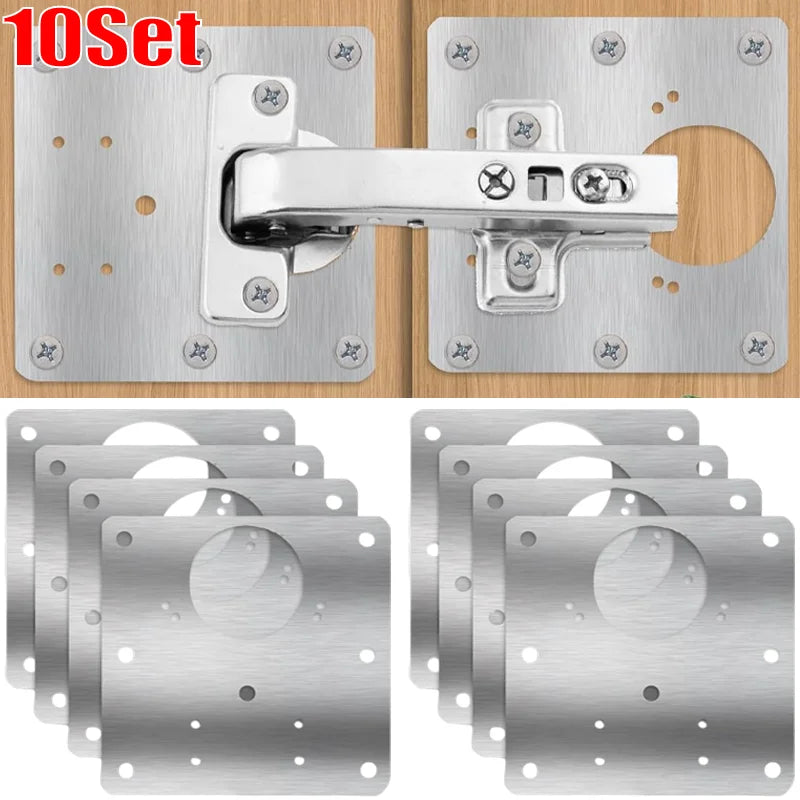 A set of stainless steel cabinet door hinge repair plates and screws for installation.
